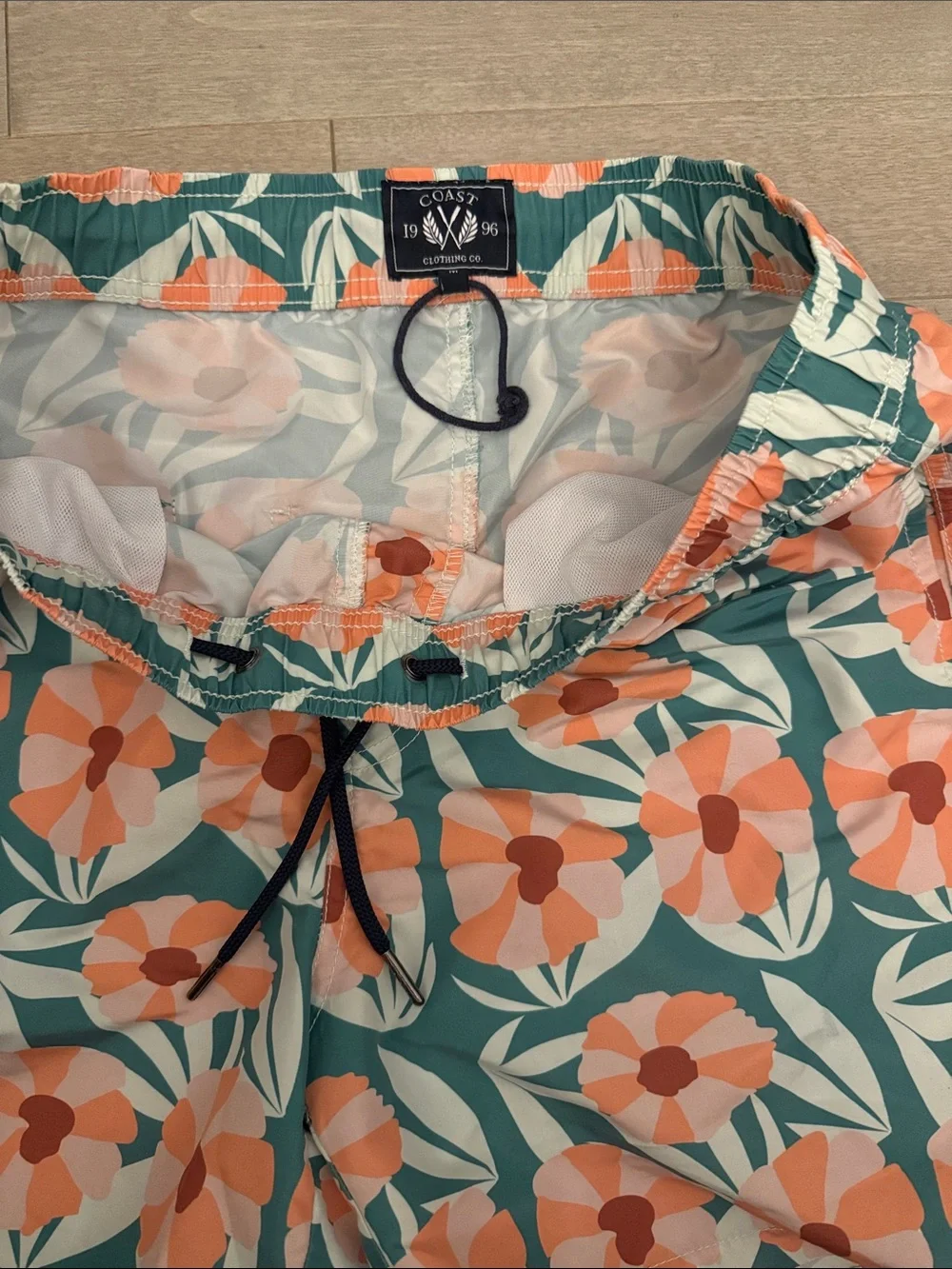 Men's Teal Floral Swim Trunks with Coral Print